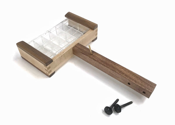 This photo shows the empty dubbing dispenser box in the swivel.