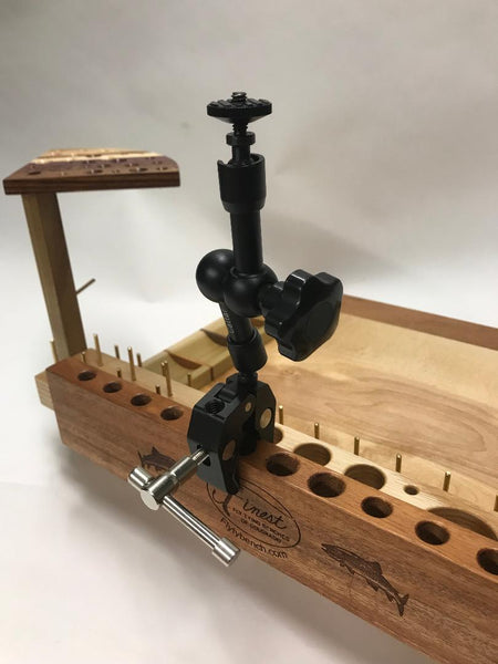 This view is showing the clamp attaching the A/V tool on a Brookie fly tying bench.